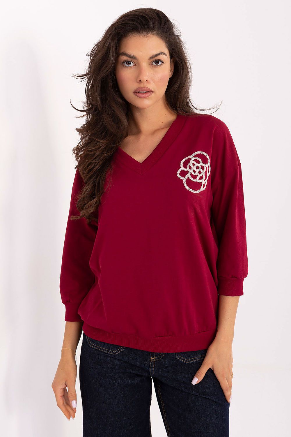 Elegant cotton blend V-neck blouse with subtle embroidery by Relevance, showcasing a casual yet refined look, perfect for work and everyday wear.