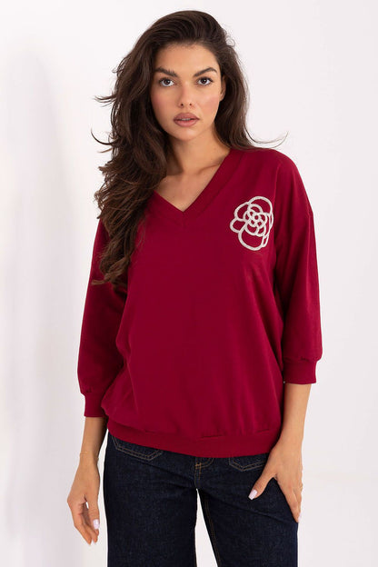 Elegant cotton blend V-neck blouse with subtle embroidery by Relevance, showcasing a casual yet refined look, perfect for work and everyday wear.