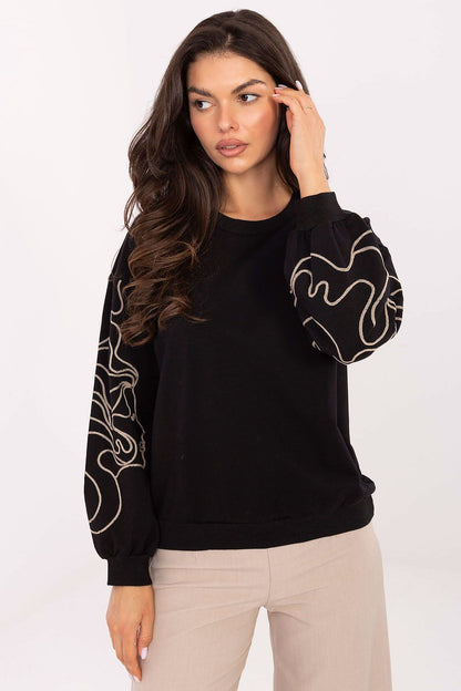 Model wearing the Luxury Women's Cotton-Blend Sweatshirt by Relevance, styled for a chic casual look, demonstrating its versatility for work or leisure.