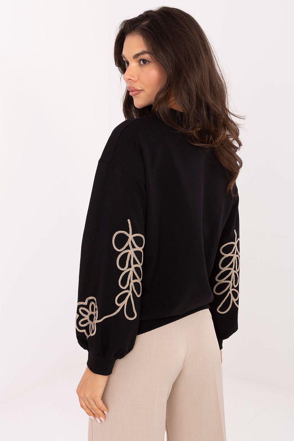 Versatile women's sweatshirt by Relevance, designed with delicate embroidery, ideal for both work and leisure outfits.