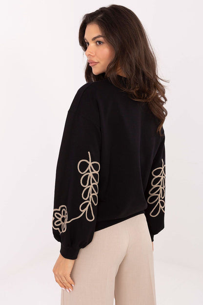 Versatile women's sweatshirt by Relevance, designed with delicate embroidery, ideal for both work and leisure outfits.