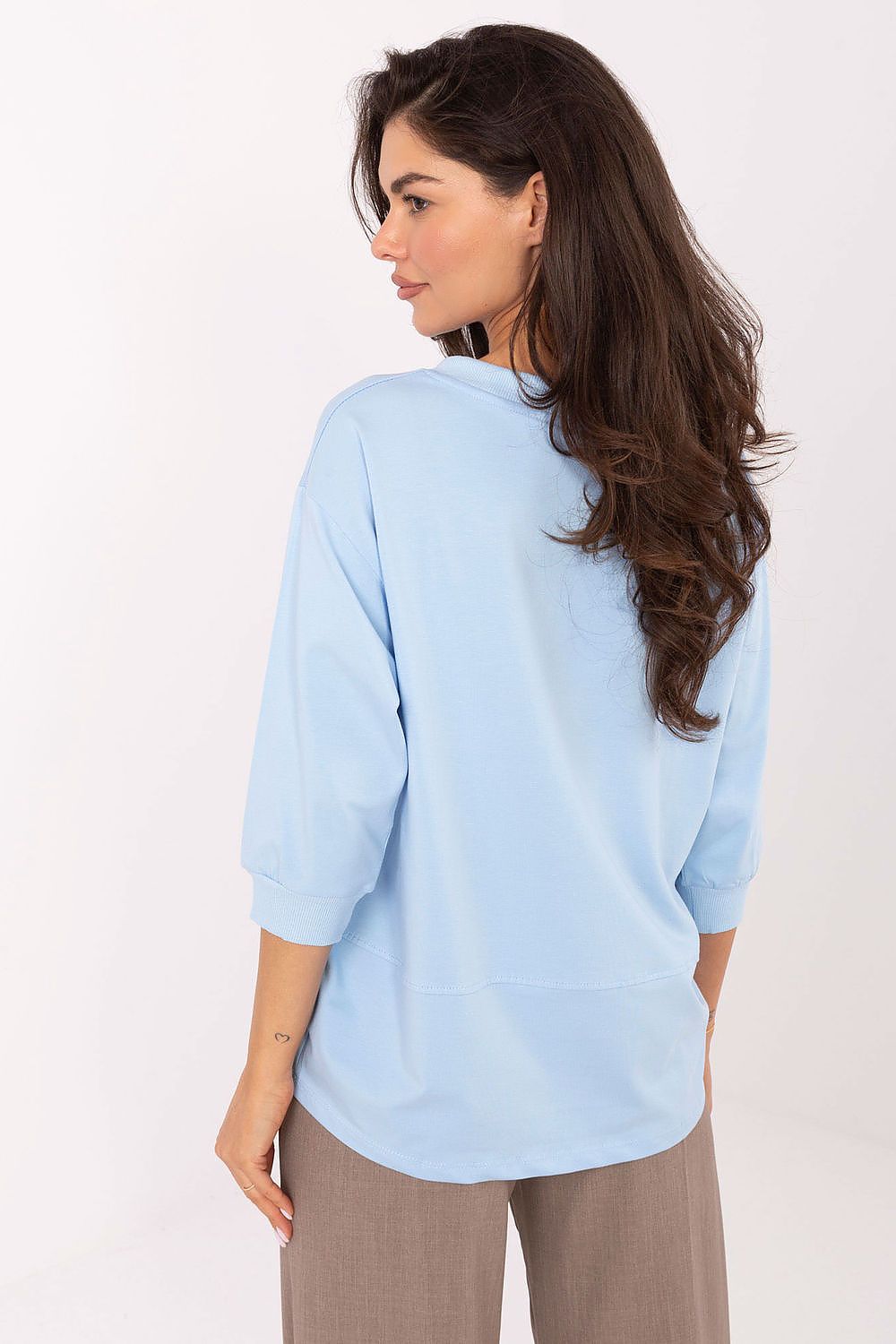 Close-up of the decorative neckline detailing on the Luxury Cotton Blend Blouse by Relevance.