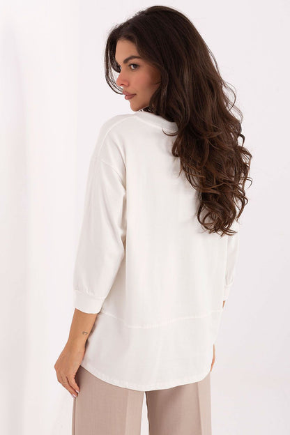 Stylish and versatile Relevance blouse in EU sizes 0-3, crafted from a soft cotton-spandex blend for comfort and sophistication.