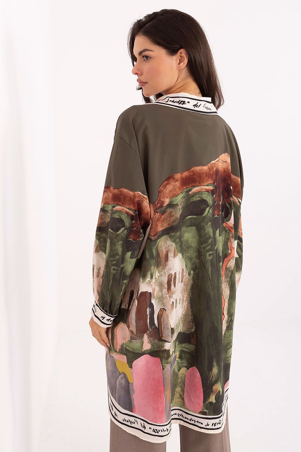 Close-up of Rue Paris Women's Long Sleeve Shirt, featuring unique printed fabric and sophisticated buttoned long sleeves.