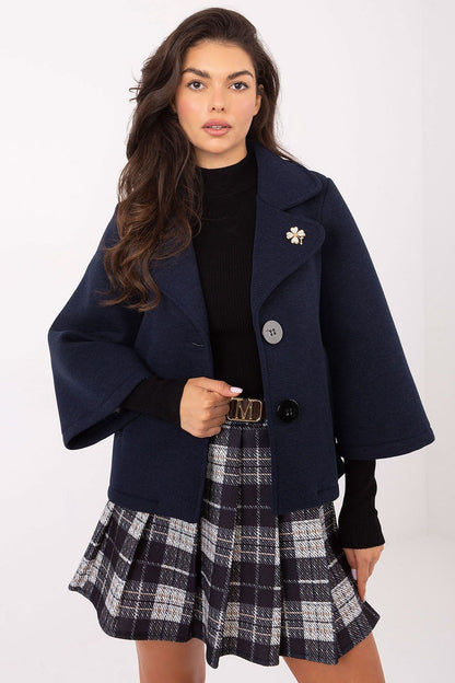 Model showcasing Rue Paris 3/4 sleeve coat in a stylish autumn outfit, ideal for transitional seasons.