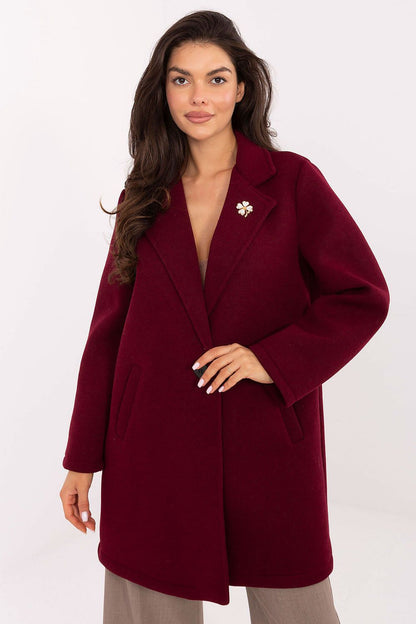 Refined Rue Paris women's coat model displayed in EU sizes 0-4, blending comfort and style for an elegant wardrobe essential.
