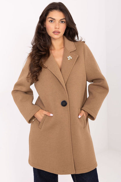 Stylish Rue Paris women's coat worn outdoors, styled flawlessly for autumn sophistication.