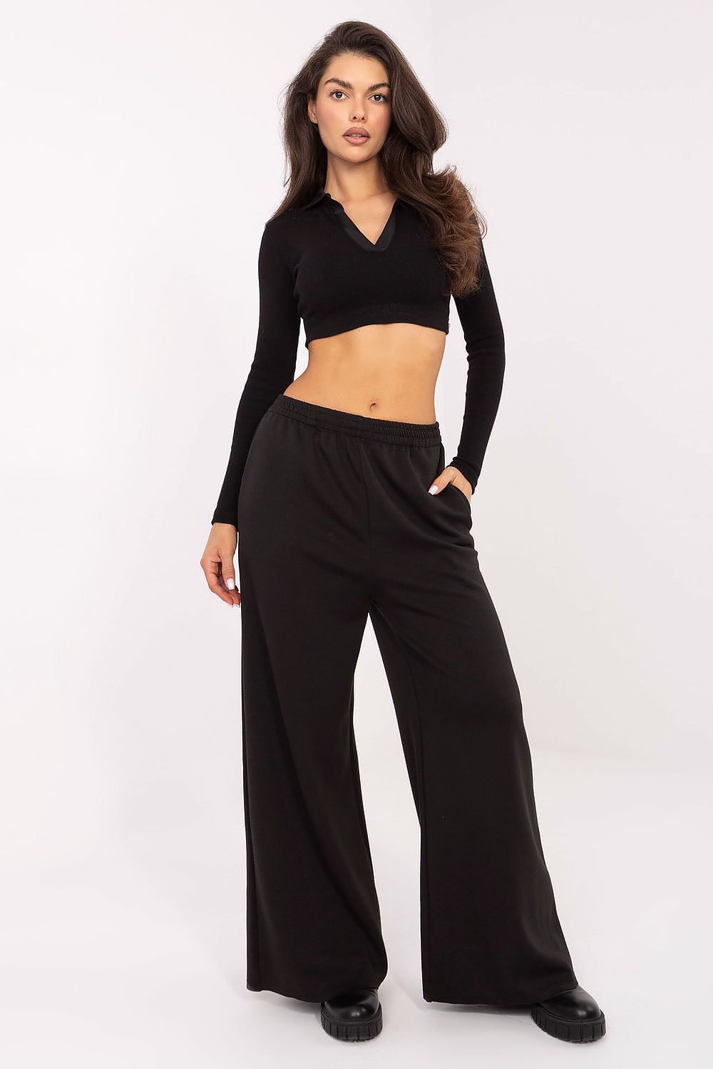 Luxury Women's Palazzo Tracksuit Trousers by Italy Moda featuring a high waist and wide leg design, crafted from soft viscose and polyester, perfect for stylish comfort.