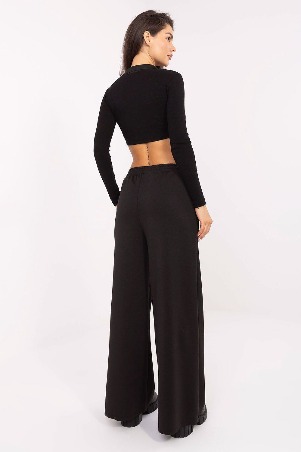 Italy Moda Luxury Women's Tracksuit Trousers with side pockets, ideal for casual chic outfits, made from a blend of 70% viscose and 30% polyester.