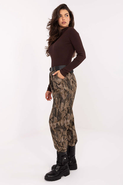 Luxe animal motif high-waisted trousers by Italy Moda displayed on a hanger, highlighting the quality fabric and contemporary design for effortless fashion.