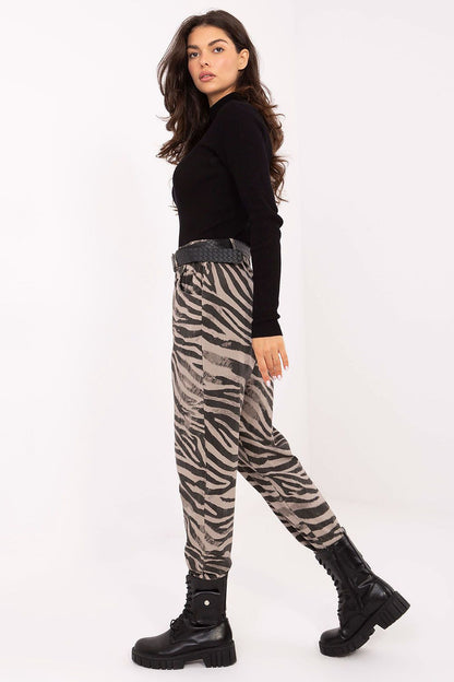 Chic women's elastic waistband trousers from Italy Moda, showcasing a stylish animal print and perfect for casual everyday elegance.