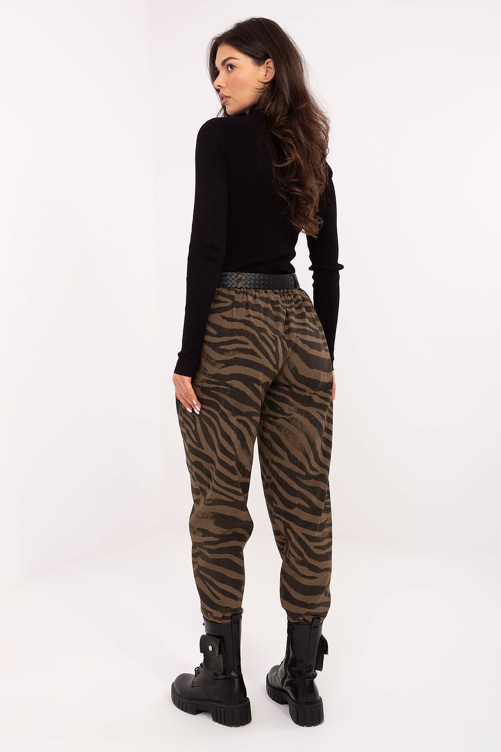 Luxe animal motif high-waisted women's casual trousers by Italy Moda, featuring tapered legs and an elastic waistband for elegant comfort.