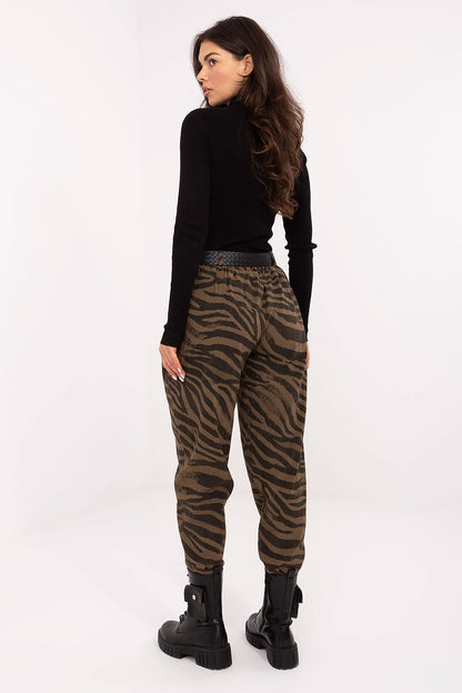 Luxe animal motif high-waisted women's casual trousers by Italy Moda, featuring tapered legs and an elastic waistband for elegant comfort.