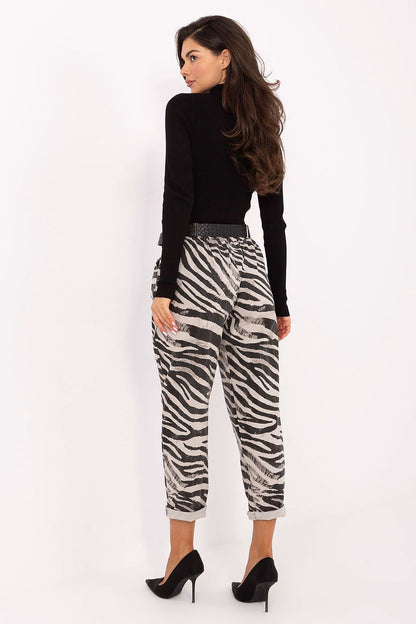 Close-up of the unique animal print on Italy Moda's high-waisted women's trousers, perfect for chic everyday elegance.