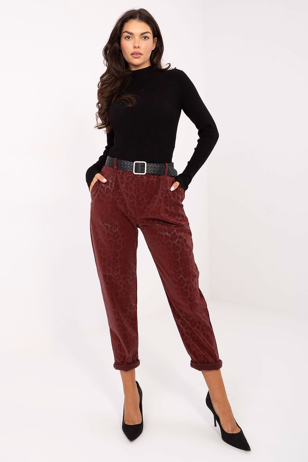 Luxury high-waisted faux leather trousers with leopard print designed by Italy Moda, showcasing a fitted silhouette and stylish tapered legs.