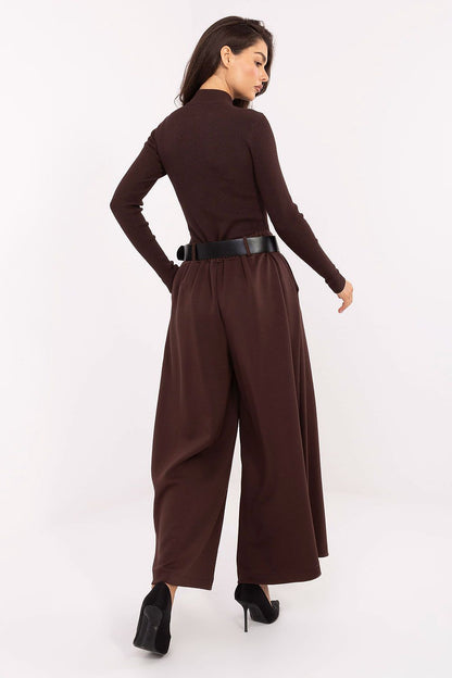 Elegant women's palazzo pants by Italy Moda, showcasing a high waist design and pockets for ultimate comfort and style.