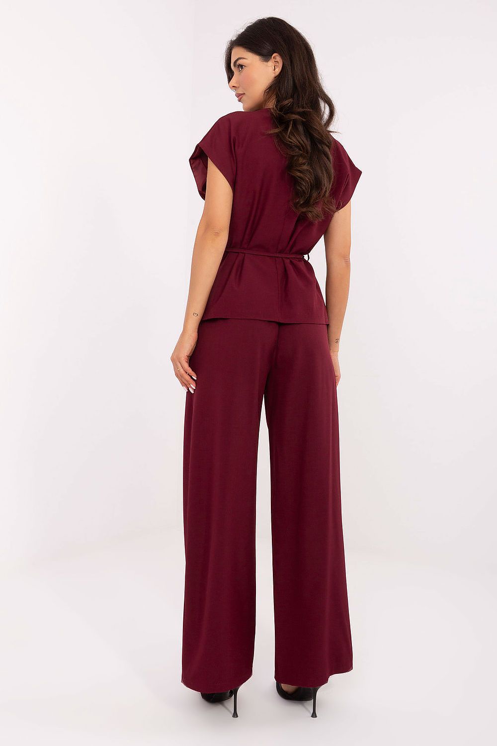 Luxury Italy Moda Women's Complete Vest and Trousers Set showcasing a smooth texture and feminine charm, ideal for daily and formal wear.