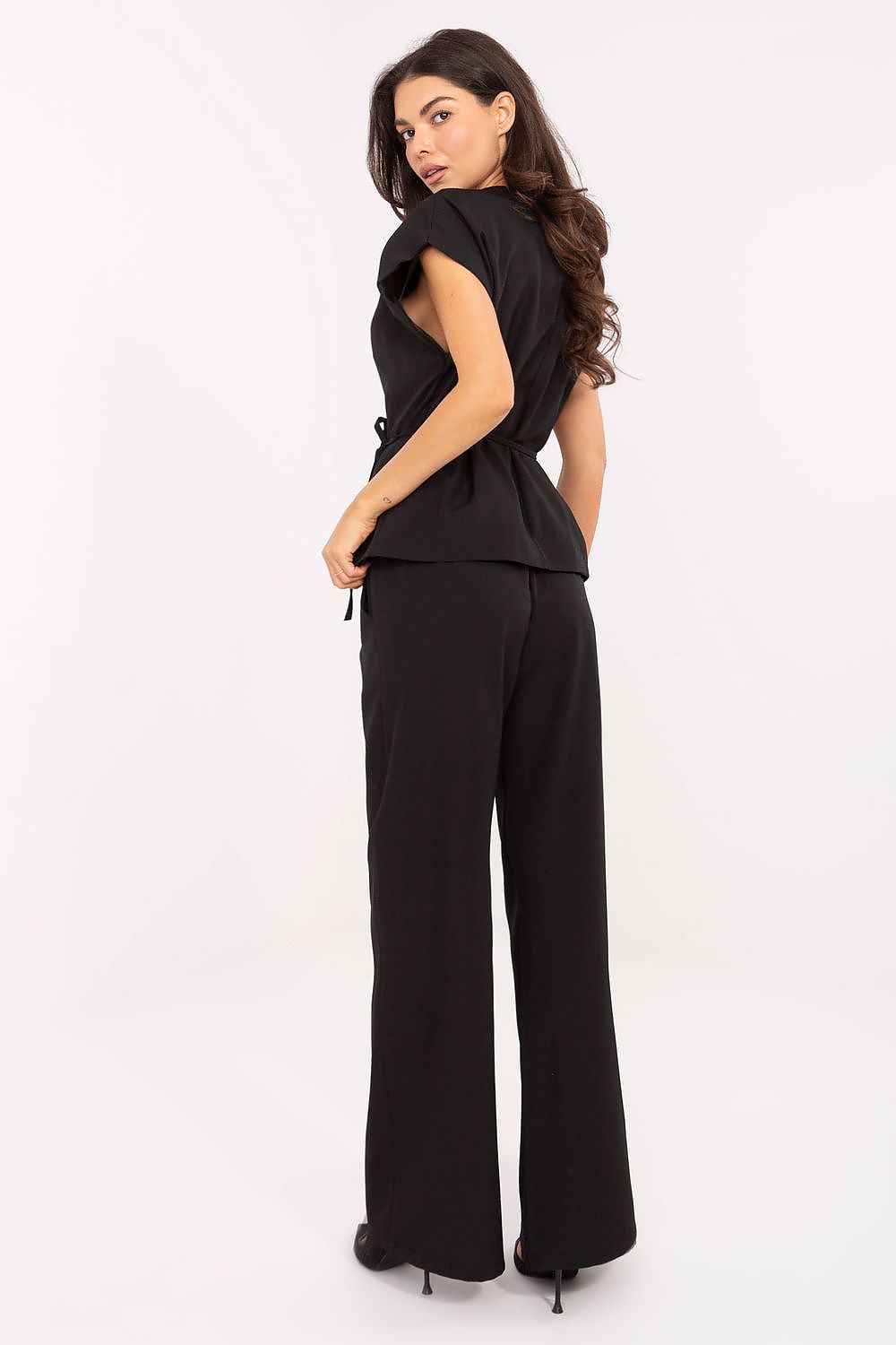 Detailed view of Italy Moda women's set, highlighting the smooth texture of viscose and polyester fabric, ideal for formal occasions.