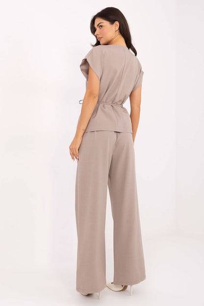 Luxury Italy Moda Women's Vest and Trousers Set in EU Size 0 featuring an elegant high-waisted design and smooth texture, perfect for formal occasions and everyday wear.