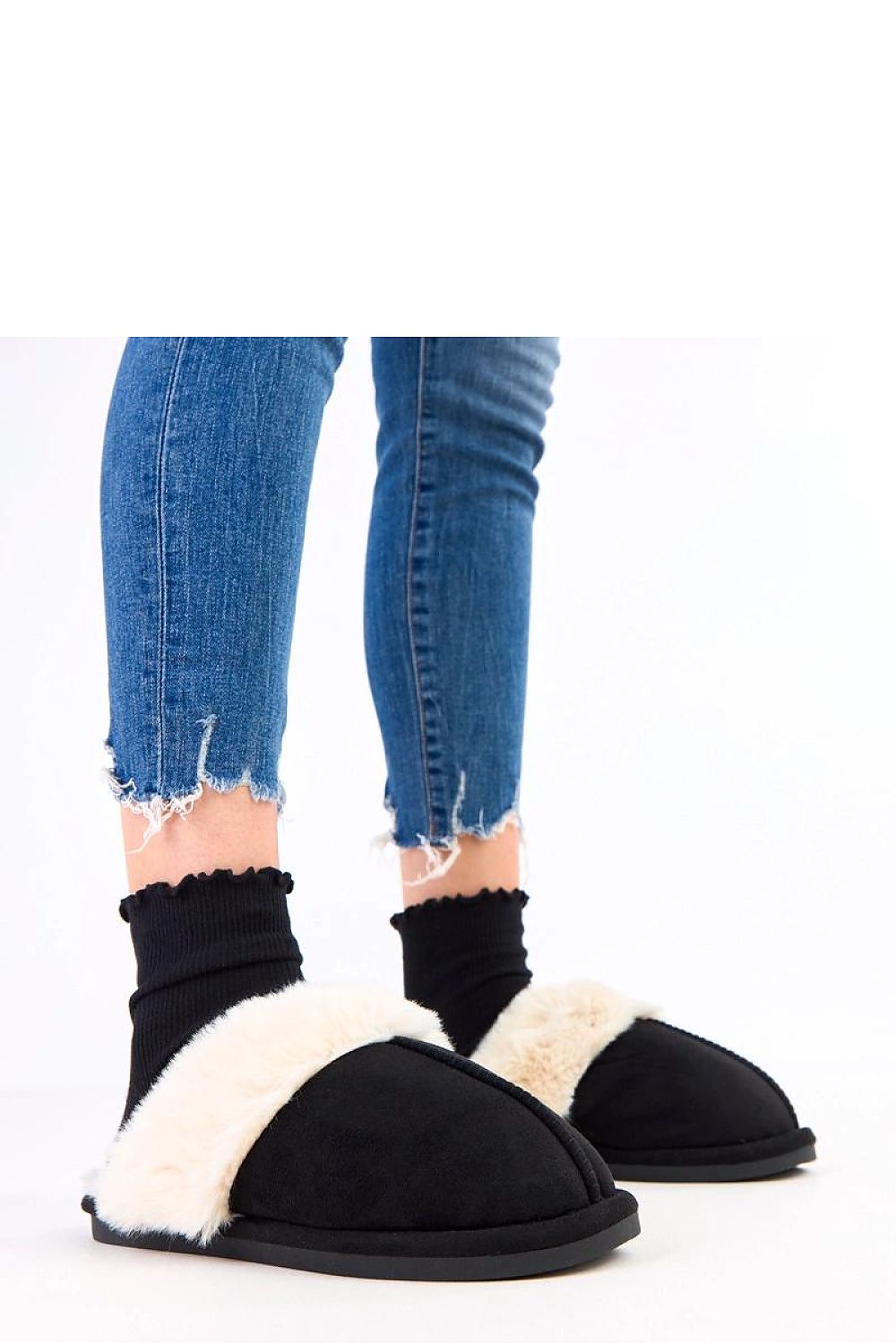 Solea Women's luxurious fur slippers, designed for ultimate comfort and warmth, showcasing the soft fabric and round toe perfect for colder days.