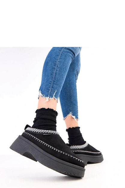 Luxurious Solea women's slip-on slippers in eco-friendly suede with intricate decorative embroidery, showcasing elegant design and comfort.