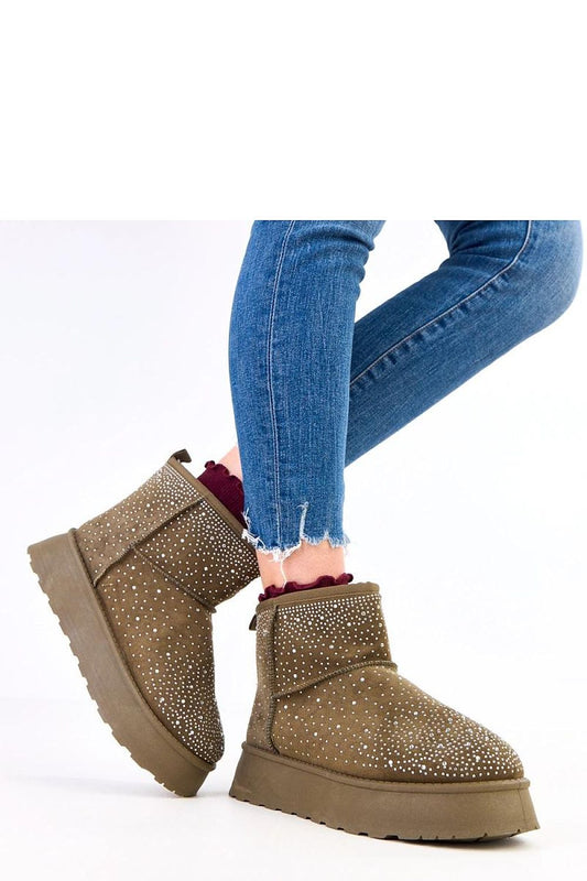 Stylish women's fur-lined snow boots by Solea with zircon accents, showcasing elegance and warmth for winter fashion.