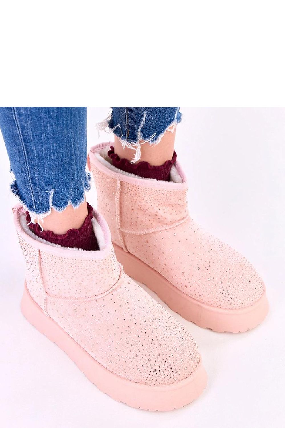 Elegant Solea women's fur-lined slip-on snow boots, exuding luxury while offering warmth and comfort for winter fashion.