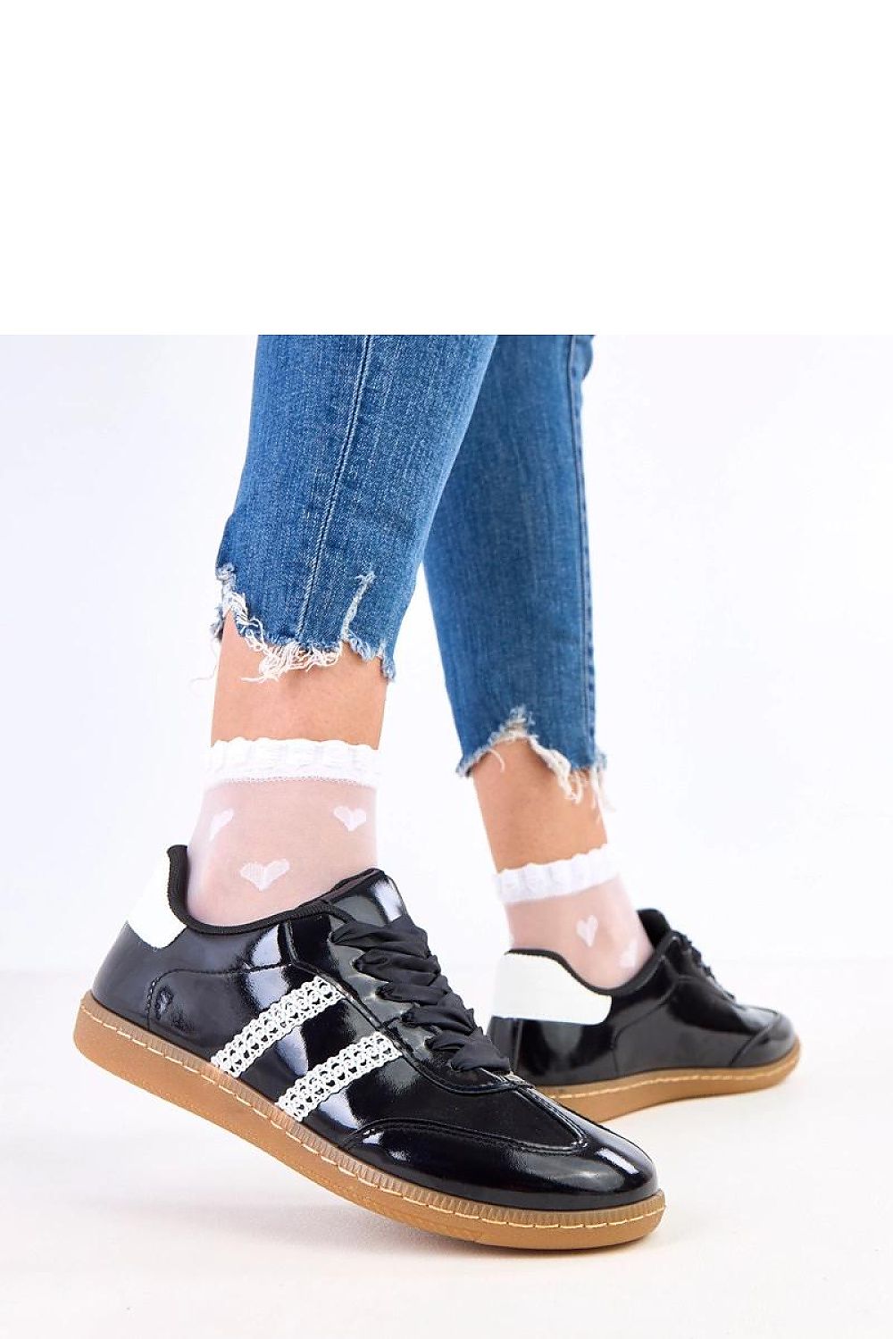 Side view of Solea women's sport shoes, highlighting the low-cut silhouette and elegant round toe for a sophisticated athletic style.