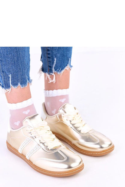 Lifestyle image of Solea women's sport shoes, perfect for chic casual styling, made with high-quality eco leather and elegant accents.