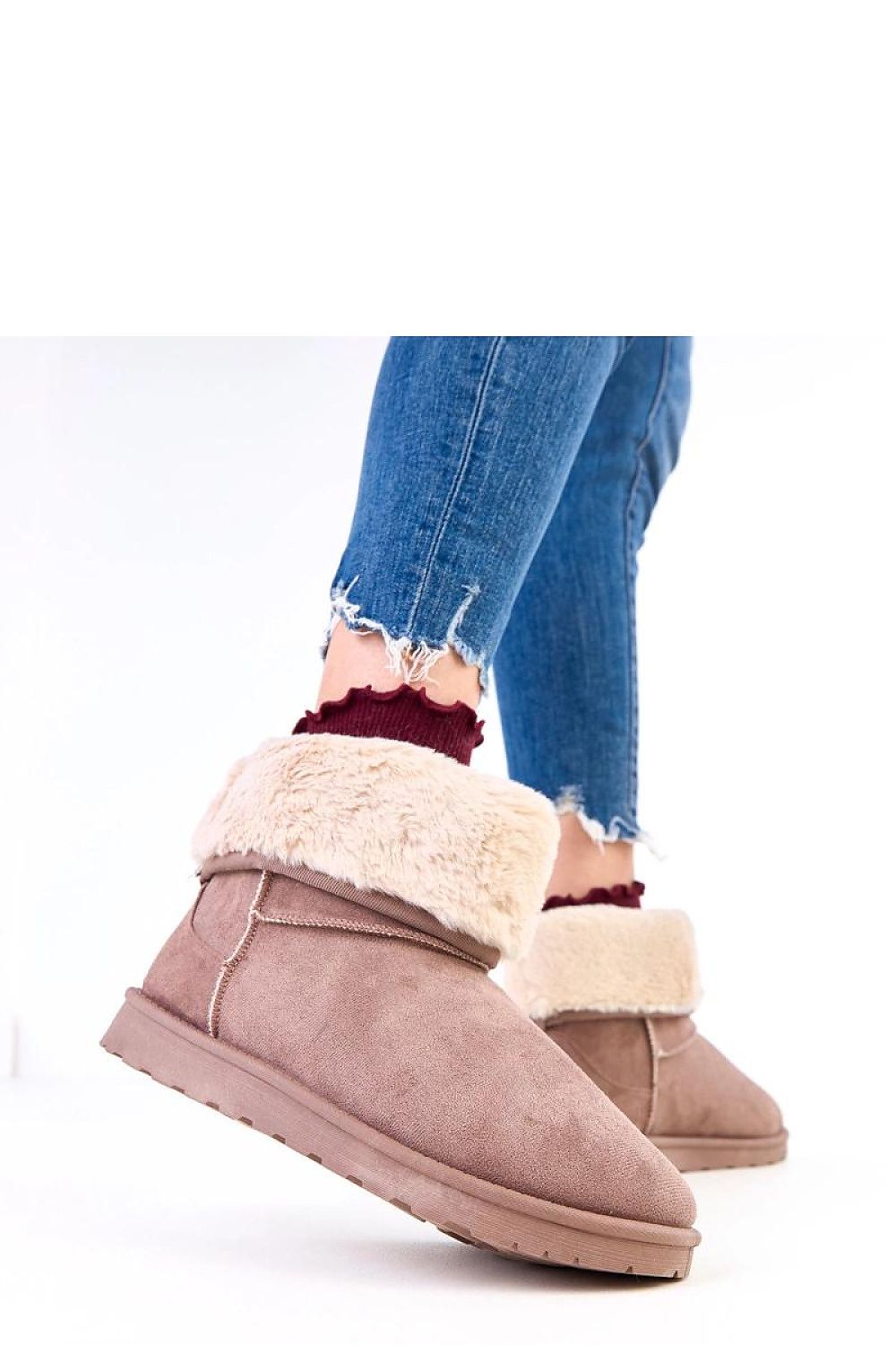 Chic women's winter boots from Solea, designed for both functionality and fashion with a plush fur interior.