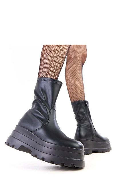 Elegant eco-leather women's ankle boots by Solea, showcasing 8 cm platform and a classic cut, ideal for fashionable everyday wear.