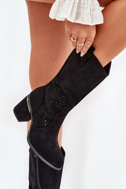 Fashion-forward open-work boots with side zipper by Step in Style, combining luxury and practicality, shown in a trendy flat lay.