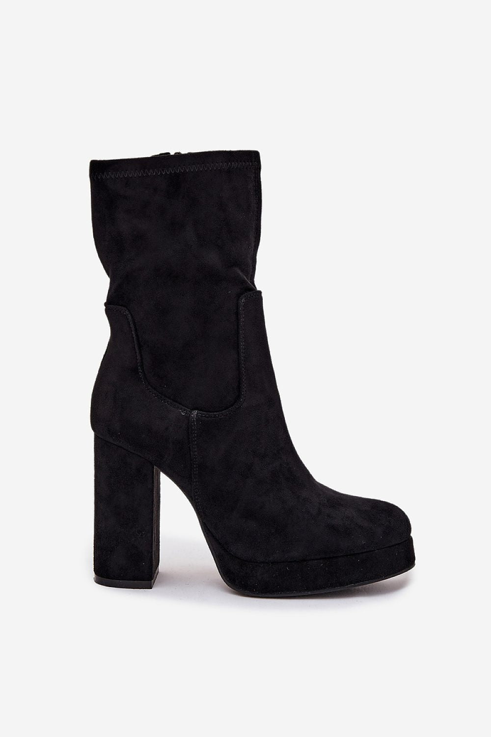 Stylish women's ankle boots from Step in Style, designed with a sleek zipper for easy wear, combining elegance with comfort for chic autumn looks.