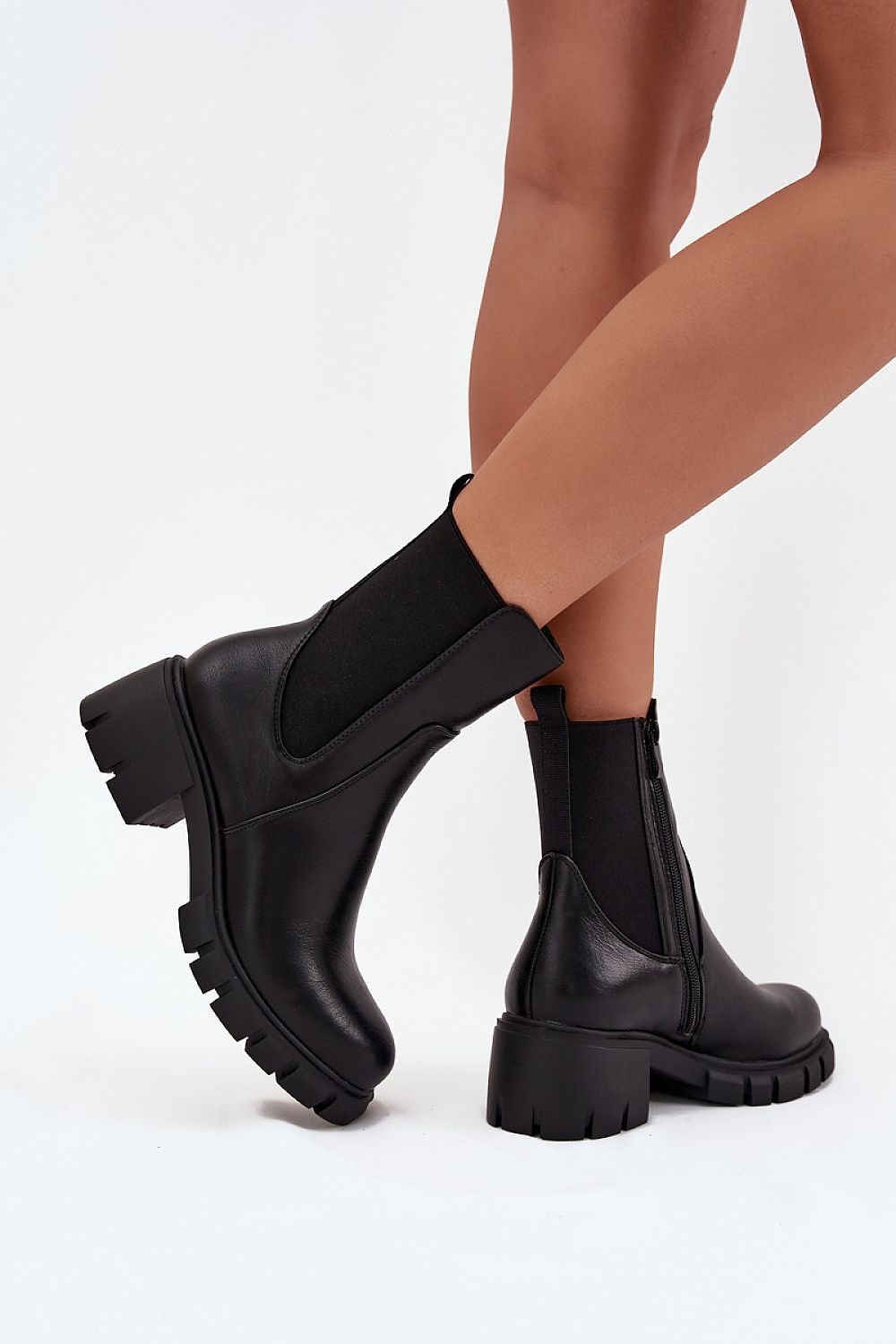 Jezzi Women's Eco Leather Ankle Boots featuring a stylish block heel and side zipper, designed for a flexible and comfortable fit, perfect for autumn and winter fashion.