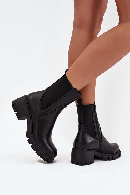 Jezzi Women's Eco Leather Ankle Boots featuring a stylish block heel and side zipper, designed for a flexible and comfortable fit, perfect for autumn and winter fashion.