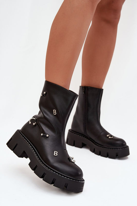 Elegant women's eco leather ankle boots with decorative studs from Step in Style, featuring warm linings and a flat heel, perfect for stylish comfort on cooler days.