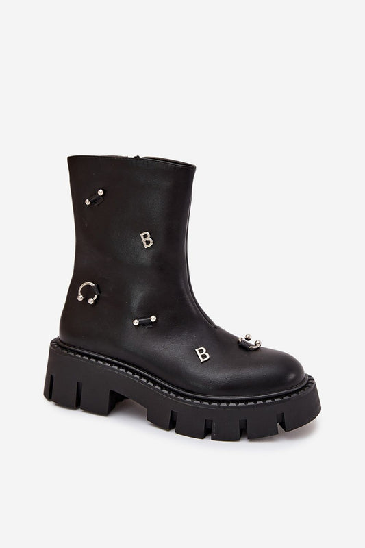 Chic women's eco leather ankle boots by Step in Style, showcasing a trendy design with studs, warm interior linings, and a convenient zipper for easy wear.
