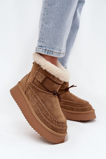 Step in Style slip-on luxury women's snow boots, perfectly suited for winter strolls with plush fur interior for essential warmth.