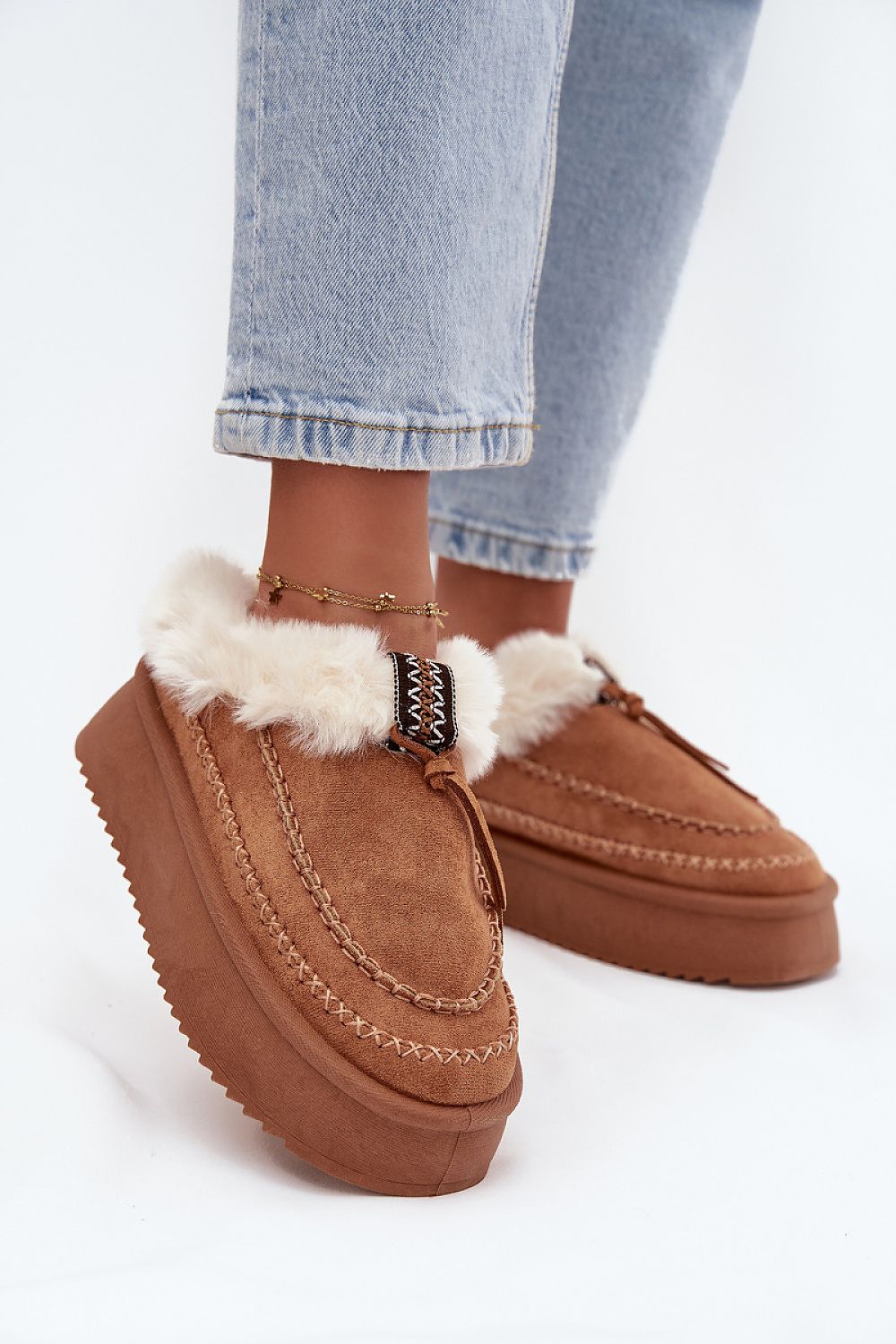 Luxury women's eco suede snow boots with fur lining, featuring a 4cm platform, designed by Step in Style, perfect for stylish winter wear.