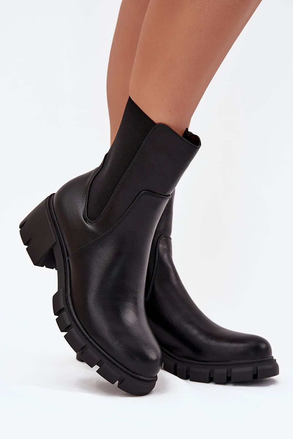 Jezzi Women's Eco Leather Ankle Boots with a refined block heel and flexible design, combining practicality and elegance in every step for the stylish woman.