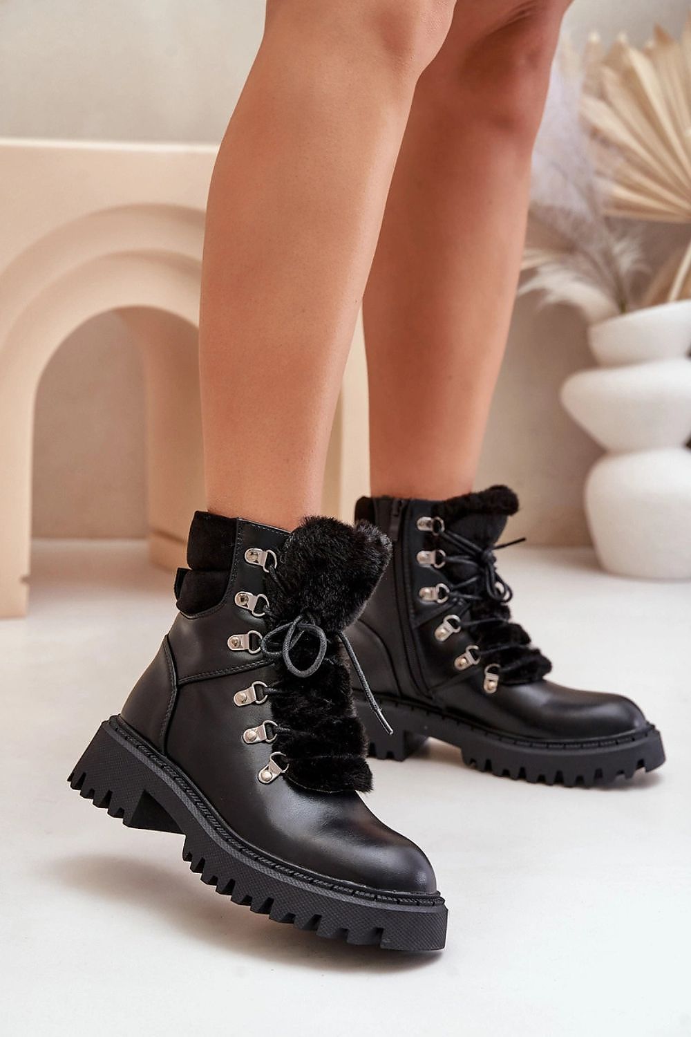 Step in Style luxury insulated ankle boots with a chic zipper and fur detailing, designed for both warmth and sophistication.