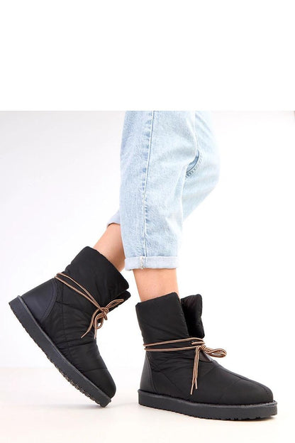 Stylish and comfortable Solea Women's Snow Boots with 2.5 cm sole height providing insulation against the cold ground.