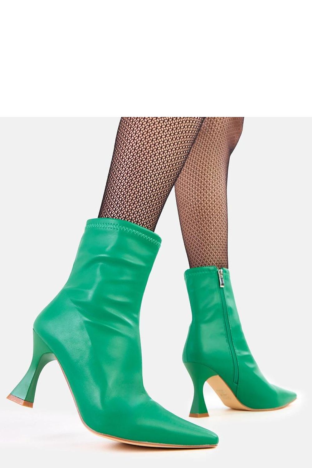 Close-up of Superior quality eco-leather high-heeled ankle boots by Solea, featuring a pointed toe and delicate heel, ideal for an elegant look on any occasion.