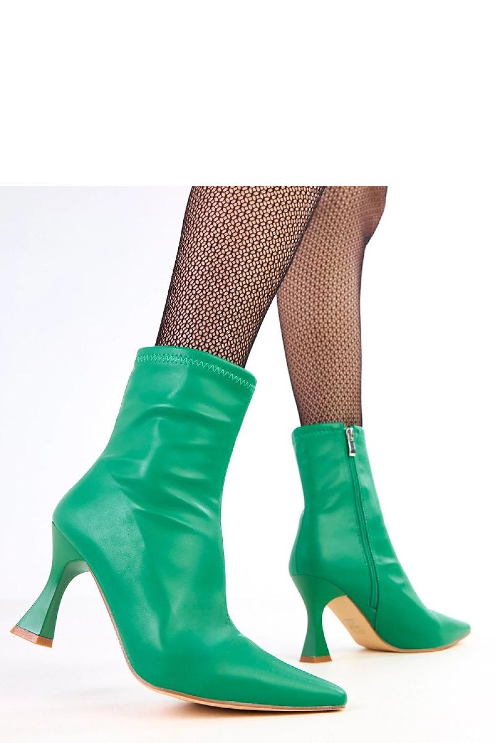 Stylish eco-leather ankle boots from Solea displayed elegantly, illustrating the chic design and comfortable fit with a zip closure and ankle strap.