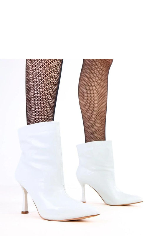 Solea Polished Stiletto Ankle Boots in eco-leather featuring a glossy finish, exemplifying elegance and style with a 13 cm high shaft and 9 cm stiletto heel.