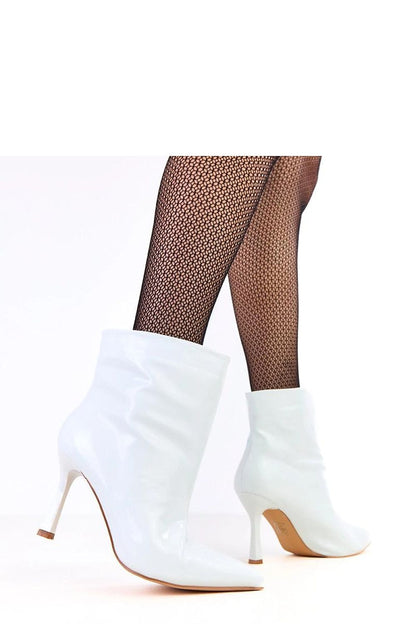 Solea Polished Stiletto Ankle Boots elegantly styled, highlighting the slim pointed toe and comfortable slip-on construction for a chic and sophisticated look.