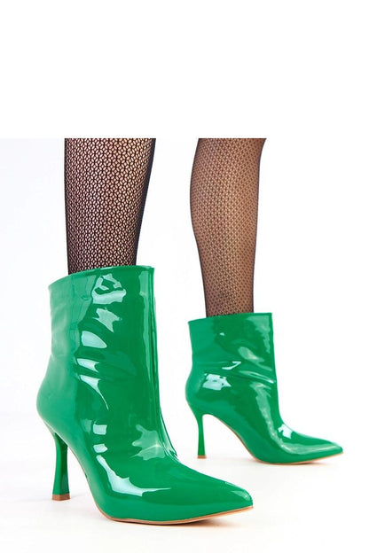 Solea polished eco-leather stiletto ankle boots showcasing a glossy finish, elegant pointed toe, and tall 13 cm shaft, perfect for adding a touch of luxury to any outfit.