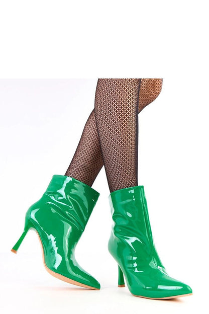 Close-up of Solea stiletto ankle boots highlighting the luxurious eco-leather material and a stunning 9 cm heel, designed for the sophisticated woman.