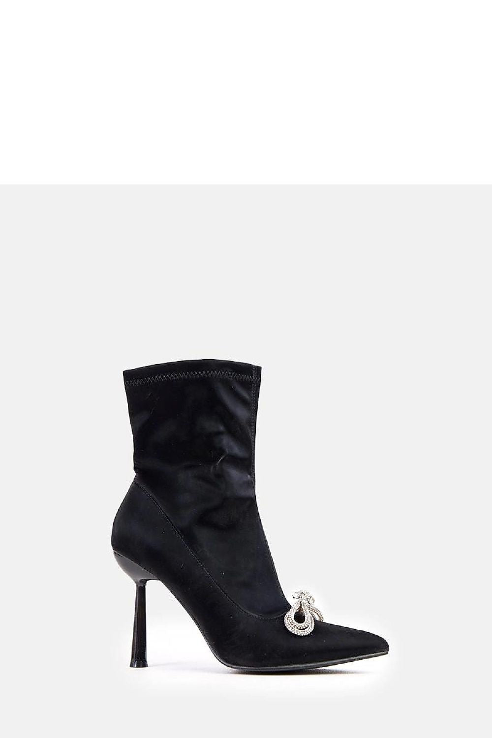 Close-up of Solea satin ankle boots highlighting the exquisite zirconia bow detailing on a sophisticated background.