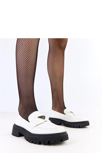 Elegant women’s slip-on loafers by Solea featuring a stylish metal ornament, crafted from eco-friendly leather, ideal for refined casual and formal wear.